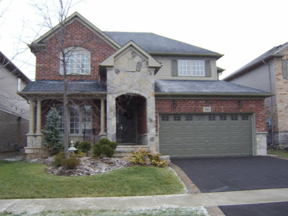 Custom stone entrance and facade on a residential exterior
